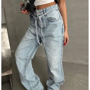 83723eeddf9332442d087b56f5b189d6afa9a732 Szerokie spodnie jeansy z wiązaniem ELIF – jasny jeans
